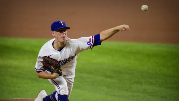 Aug 28, 2021; Arlington, Texas, USA; Texas Rangers relief pitcher Kolby Allard (39) pitches against the Houston Astros during the first inning at Globe Life Field.